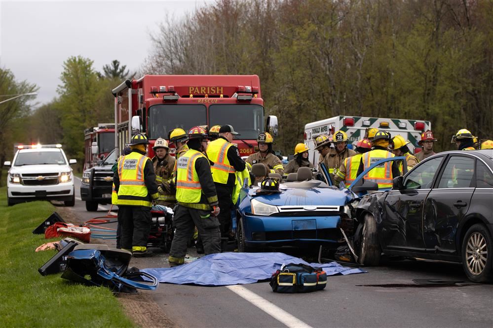  Local first responders react to a staged crash scene in front of APW juniors and seniors.